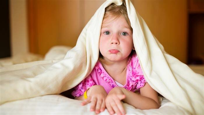 Study: Putting kids to bed early means better mental health... for mom