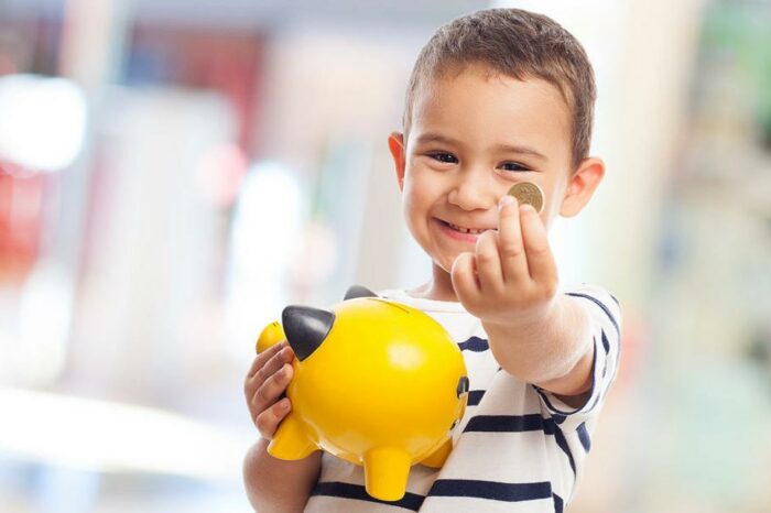 Study: Just playing with money makes children more likely to work hard—and give less